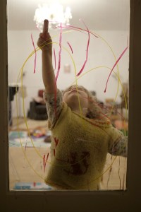 Child Drawing With Washable Window Crayons