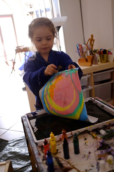 Child doing Suminagashi with Japanese Marbling Inks and Fabriano Paper