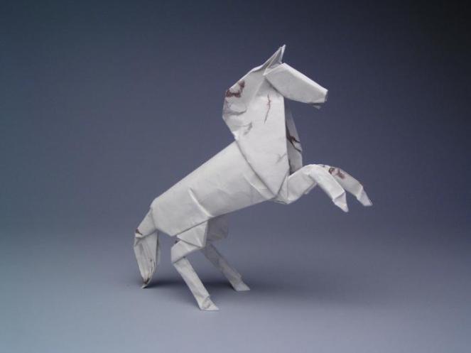 Created: 2002 Medium: One uncut square of Origamido paper Dimensions: 12" Artists: Robert J. Lang Composition: Alamo Stallion, Opus 384