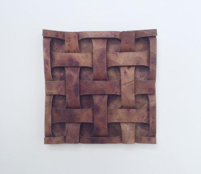 Created: 2015 Medium: One uncut square of camphor wood veneer laminate Dimensions: 8" x 8" x 1" Artists: Robert J. Lang Composition: Curved Square Weave, Opus 665