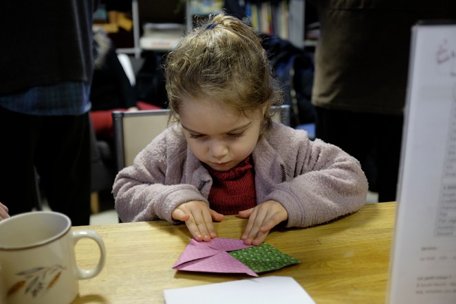 Child Folding Origami Paper Envelope
