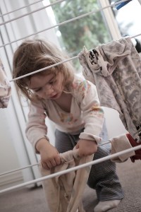 Toddler Hanging Laundry